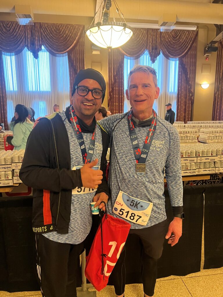 Munish and Matt Moloci at the 2025 Around The Bay Road Race