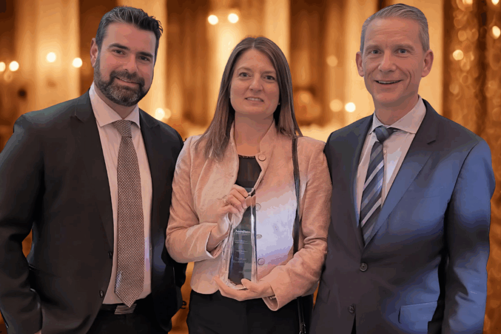 Picture of Managing Partner Danielle Iampietro with Partners Mike Stanton and Matthew Moloci